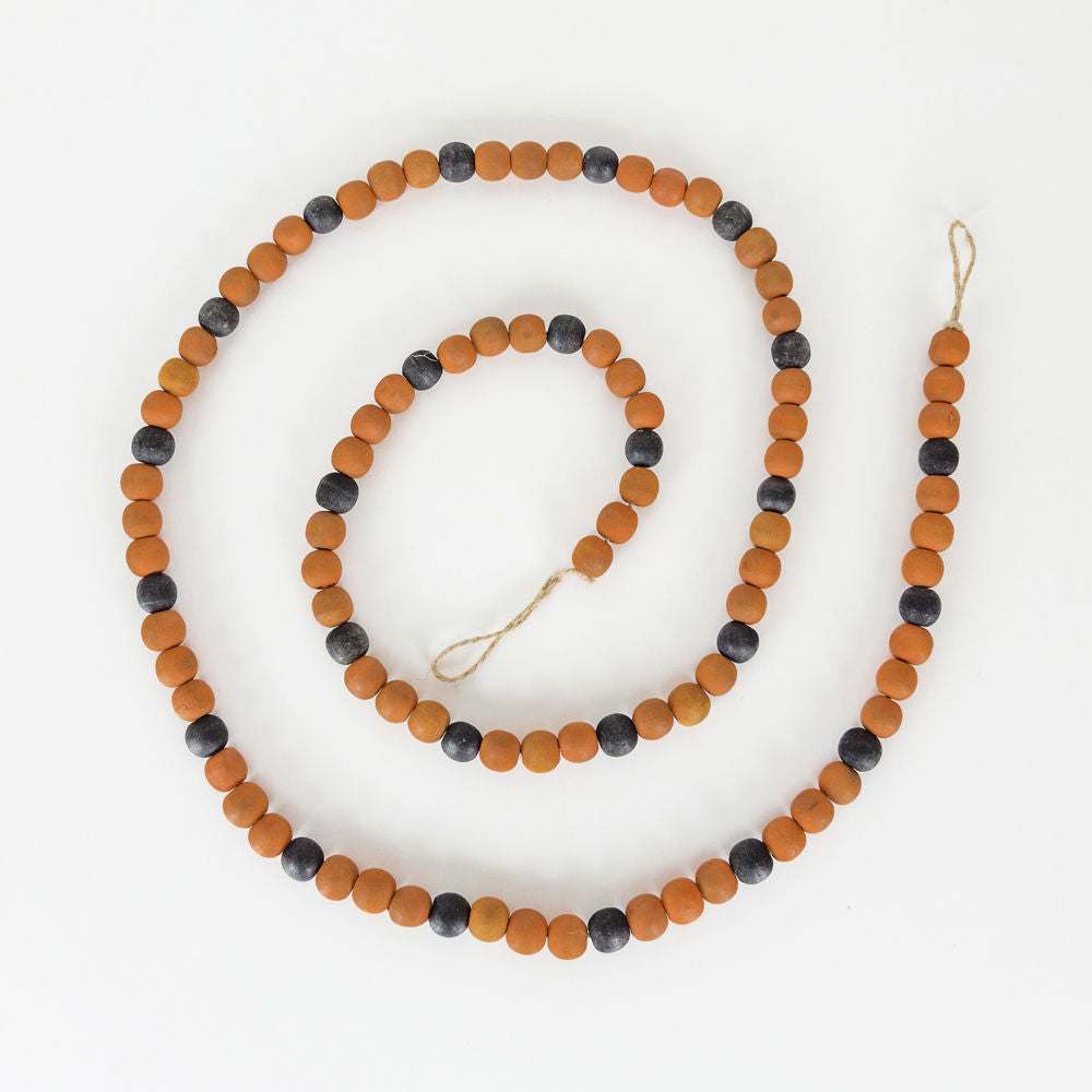 60x.5 wood bead garland or/bk